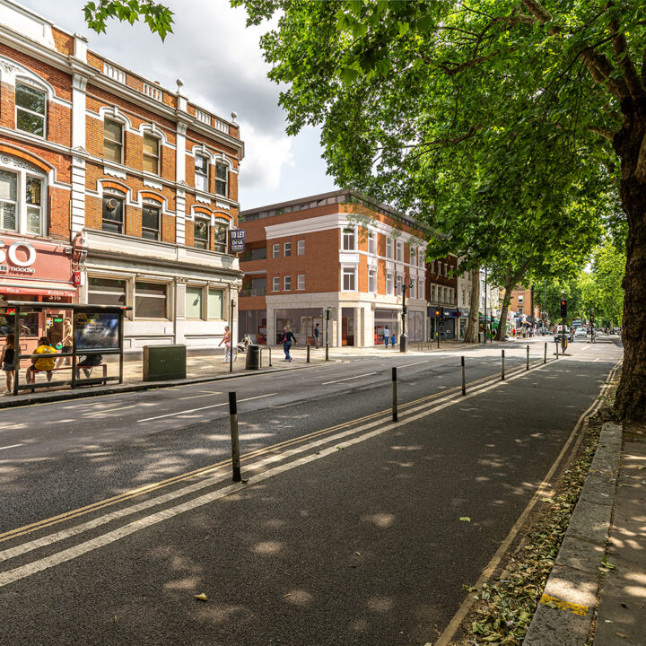 Exterior CGI rendering, a photomontage of a new residential and commercial development in the UK.